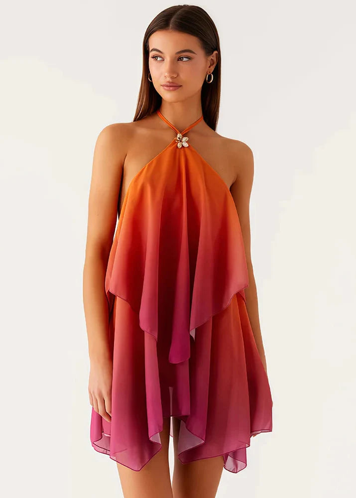 Elegantes kurz geschnittenes Kleid mit pinkfarbenem Farbverlauf und Rüschen