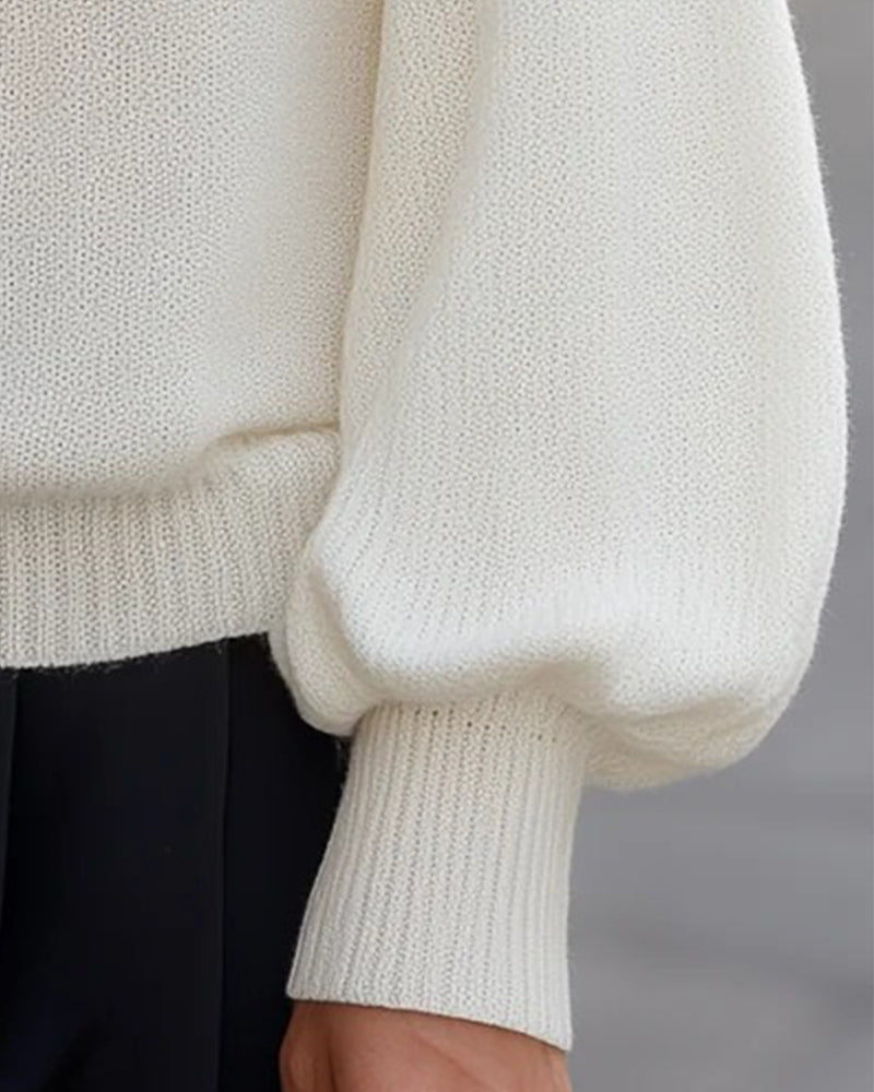 Damenpullover mit femininem Off-Shoulder-Ausschnitt und detailreichen Ballonärmeln