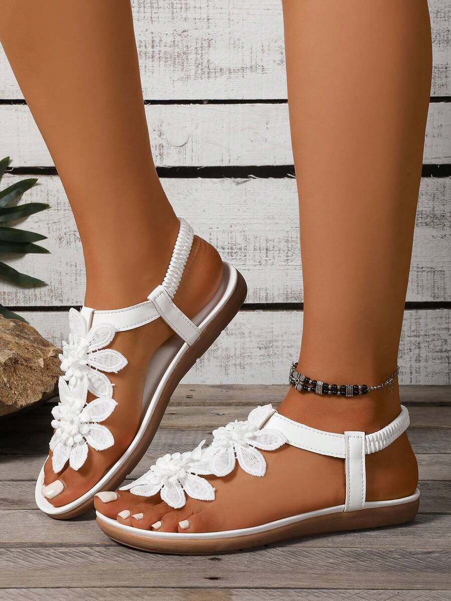 Damen Sandalen mit sicherem Fersenriemen und Blumenapplikation