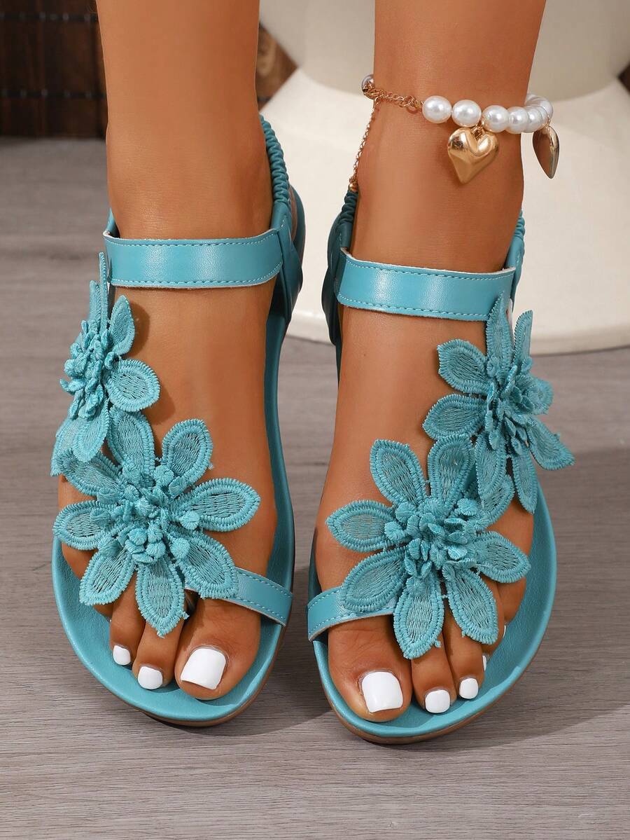 Damen Sandalen mit Blumenverzierung und komfortabler Passform