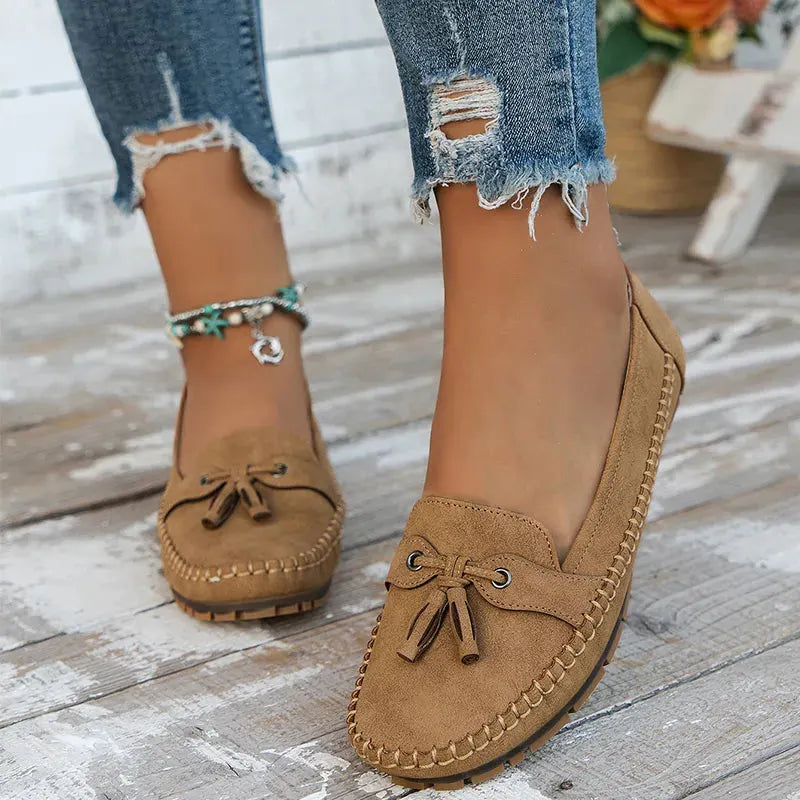 Leichter Damen Slipper mit flacher Sohle und Schleife