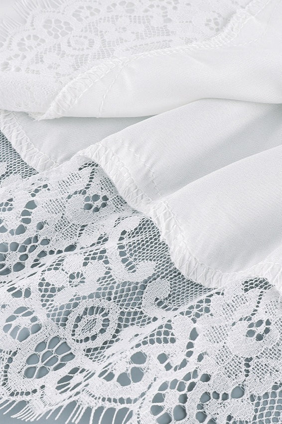 Damenbluse mit lockerem Schnitt und femininen Spitzendetails