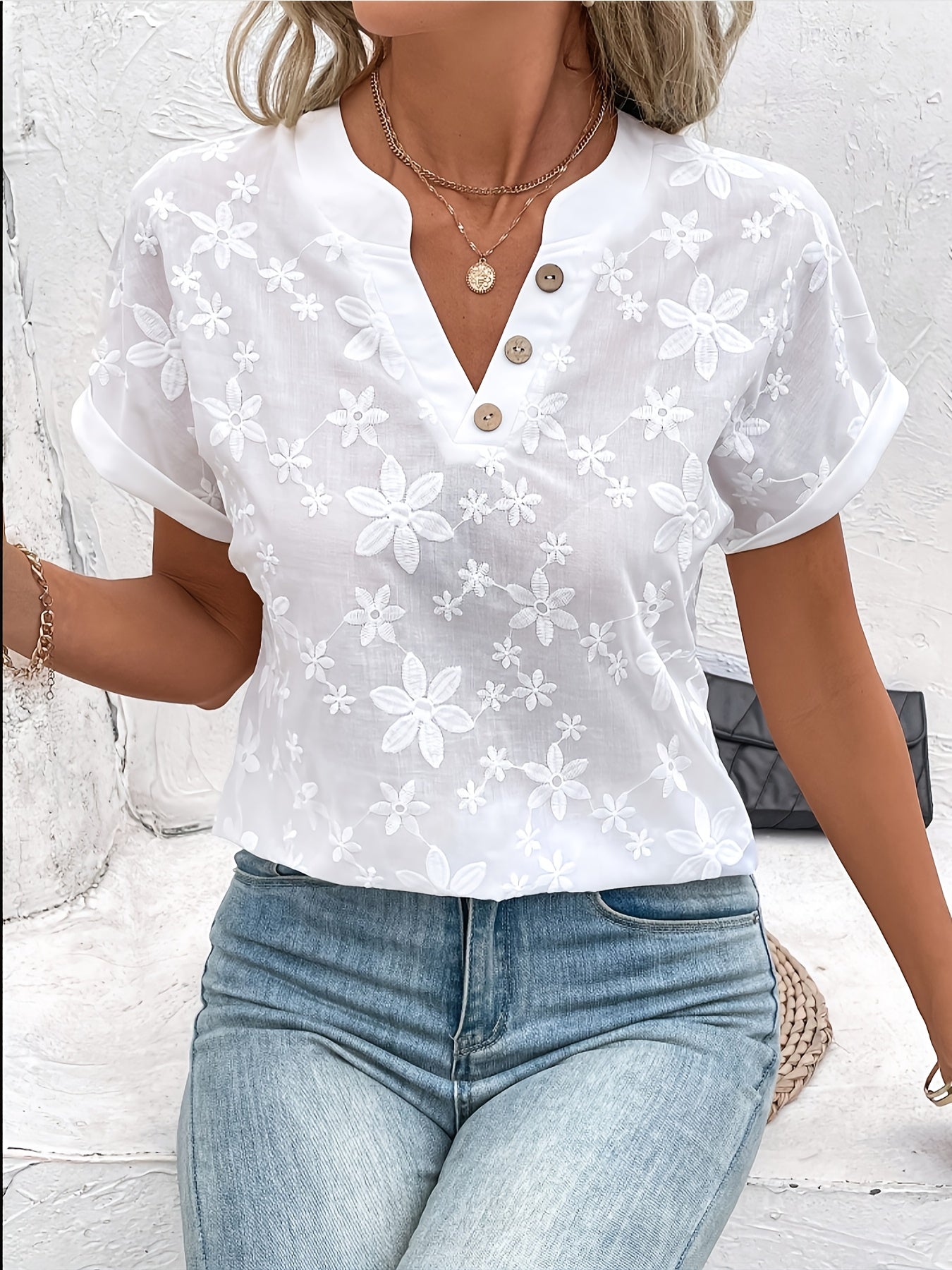 Lockere Sommerbluse für Damen mit floralem Muster und Fledermausärmeln