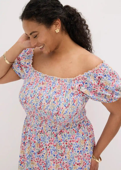 Damen Midikleid mit Blumenmuster in seitlicher Ansicht