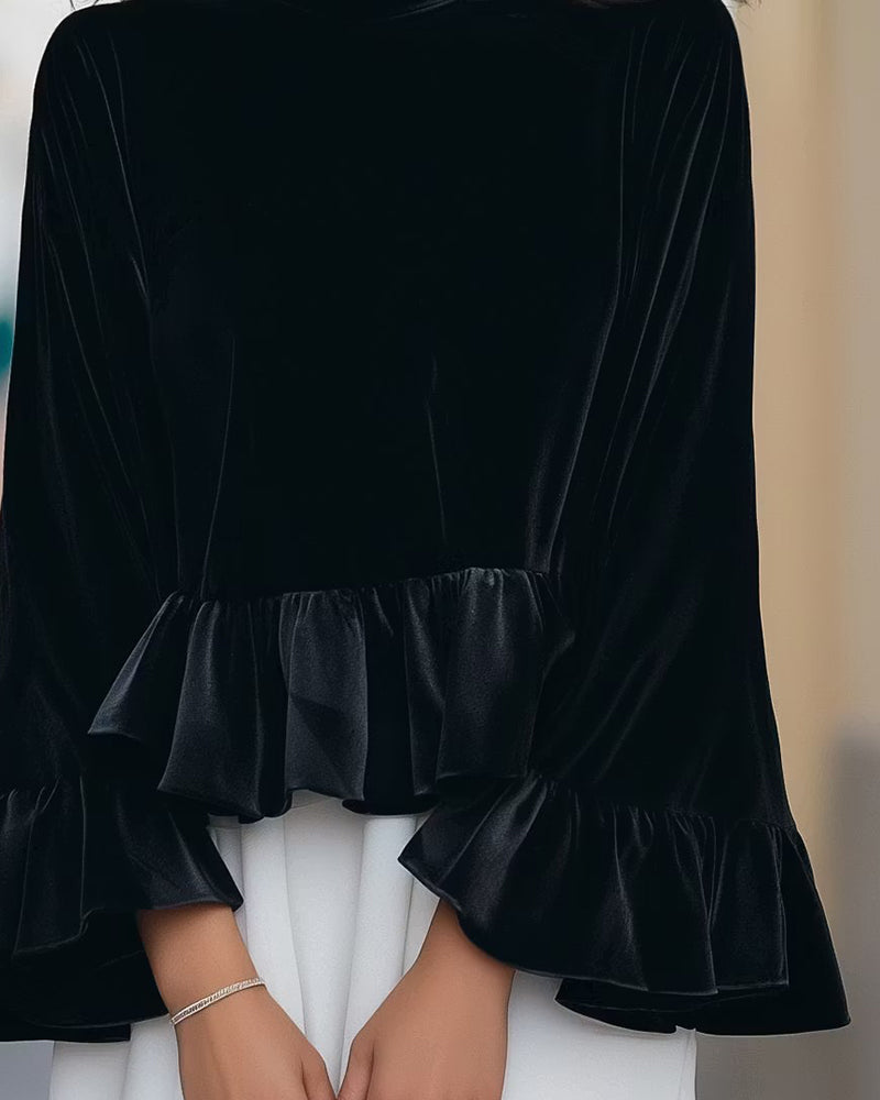 Damenbluse aus Samt mit femininem Rundhalsausschnitt