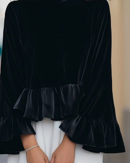Damenbluse aus Samt mit femininem Rundhalsausschnitt