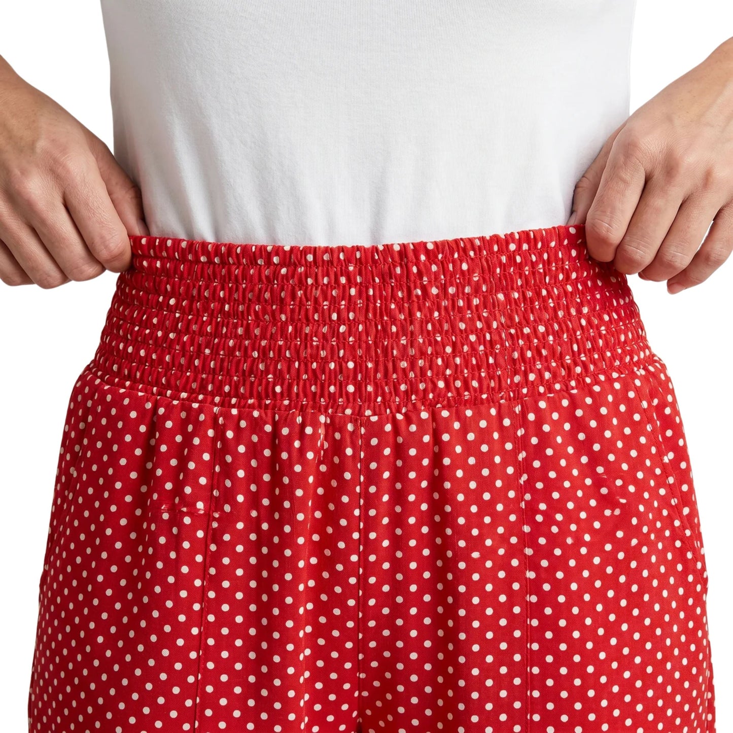 Damenweite Hosen mit locker fallendem Schnitt und gepunktetem Muster
