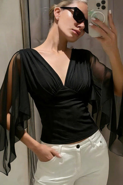 Damenbluse mit elegantem Mesh-Patchwork für Büro und Freizeit getragen