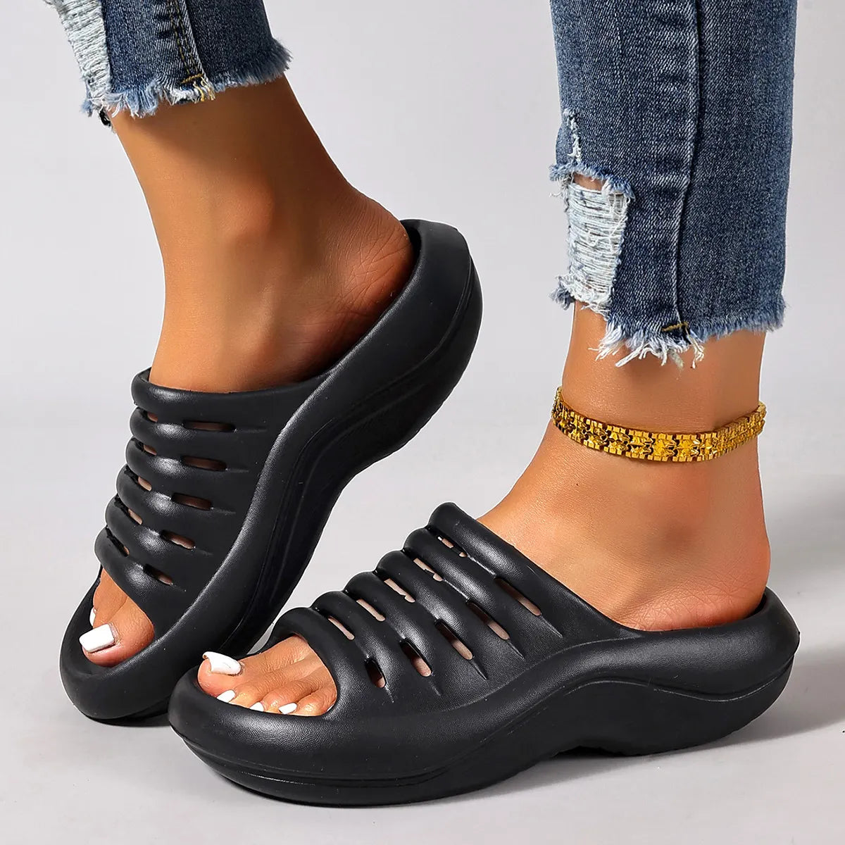 Damen Slip-on Sandalen mit dicker Sohle in seitlicher Ansicht