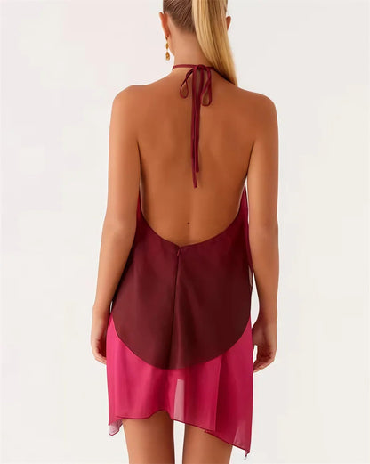 Elegantes kurz geschnittenes Kleid mit pinkfarbenem Farbverlauf und Rüschen