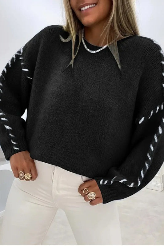 Rückansicht des Damen-Strickpullovers mit schlichtem Strickdesign
