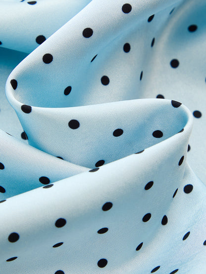 Detailansicht des Tupfenmusters auf einem Damen Maxirock aus Satin