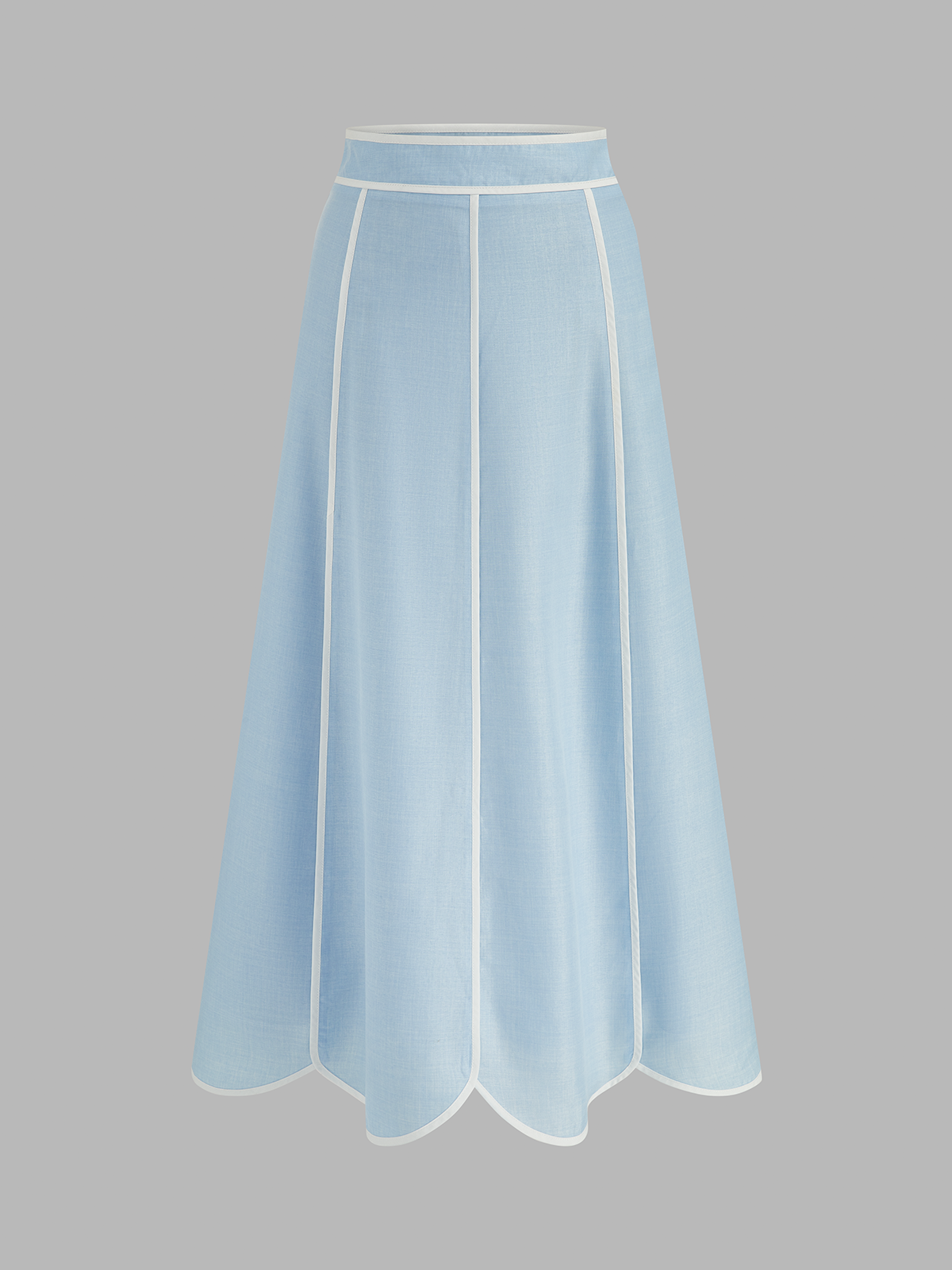 Detailansicht der Wellenkante am Halterneck-Crop-Top des Damen Rock-Sets