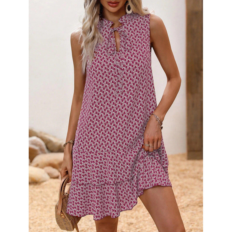 Damen Midikleid mit geometrischem Muster und Schleife in Seitenansicht