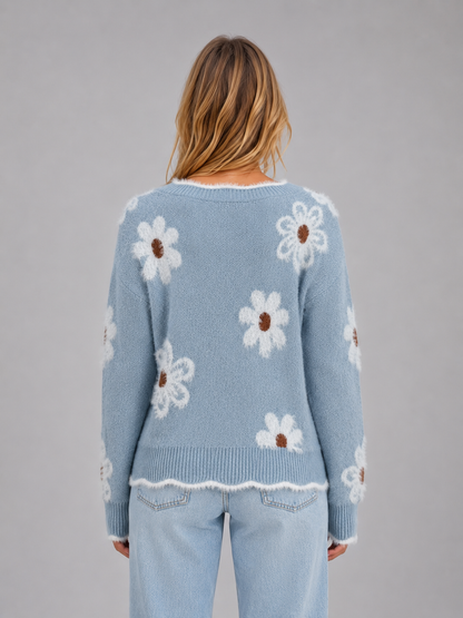 Weicher Damenpullover mit floralem Muster und langen Ärmeln im Detail