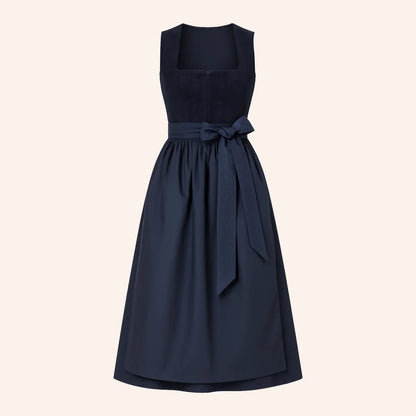 Marineblaues Dirndl für Damen mit abgestimmter Schürze und klassischem Design