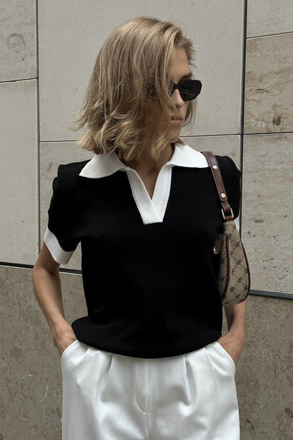 Damen Polo-Strickpullover in Schwarz mit Kontrastkragen, Frontalansicht