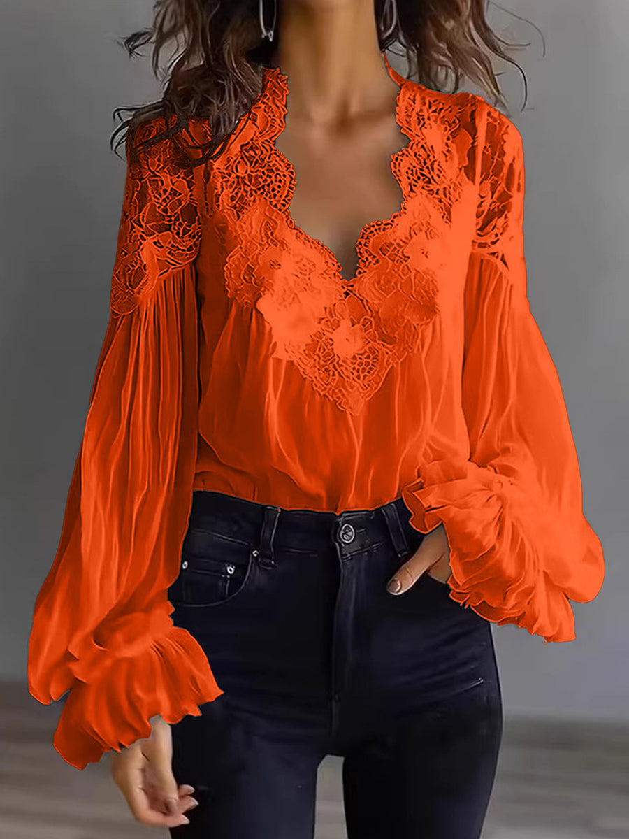 Damenbluse mit Spitzen- und Patchwork-Einsätzen und Puffärmeln