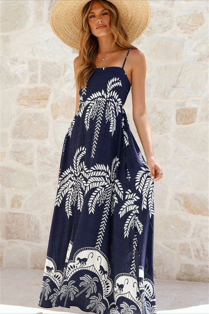 Seitenansicht des langen Damenkleids mit floralem Allover-Print