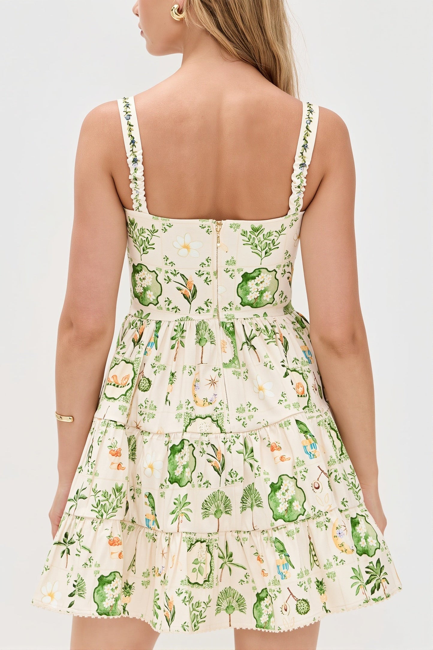 Damen-Midikleid mit Pflanzenprint und Trägern in Rückenansicht