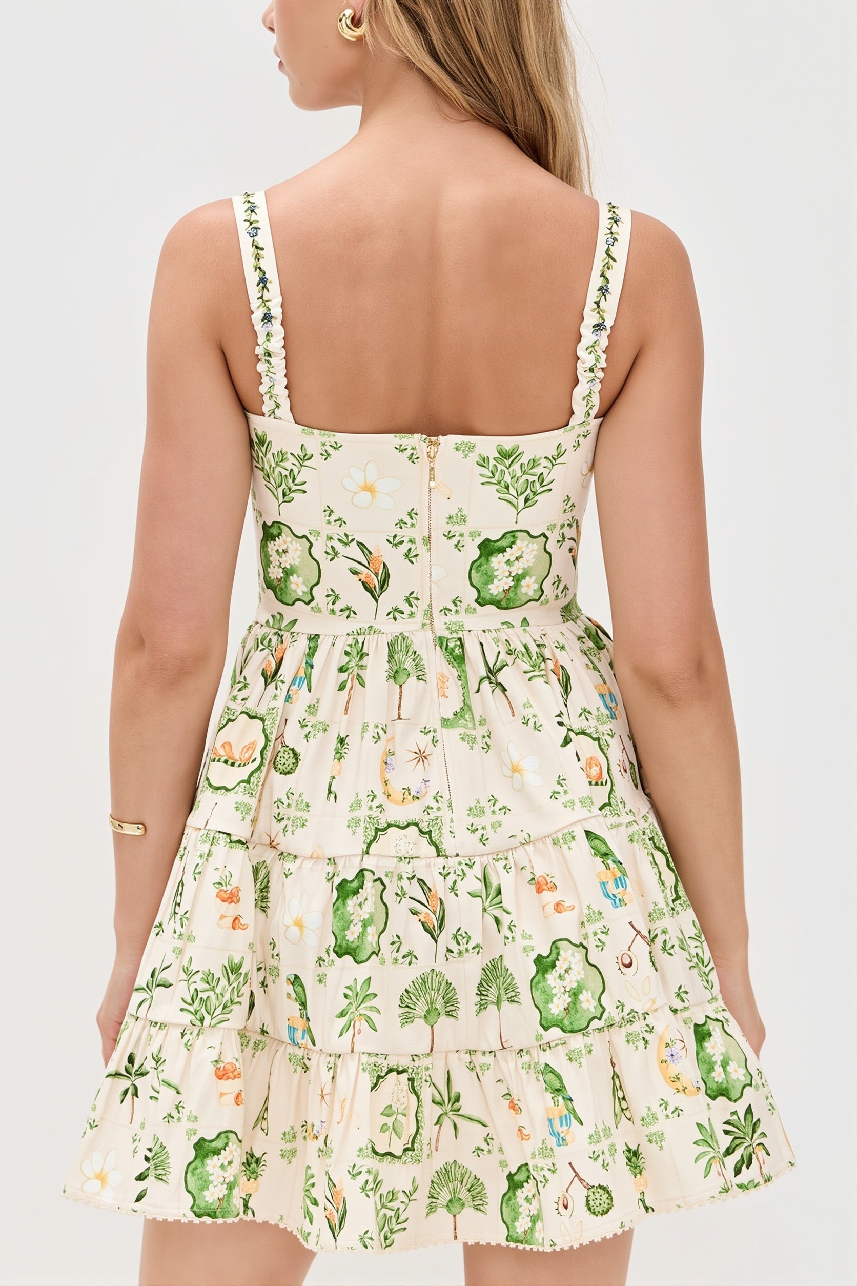 Damen-Midikleid mit Pflanzenprint und Trägern in Rückenansicht