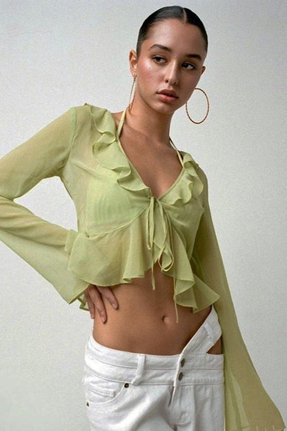 Seitliche Ansicht der transparenten Damen Crop-Bluse mit V-Ausschnitt