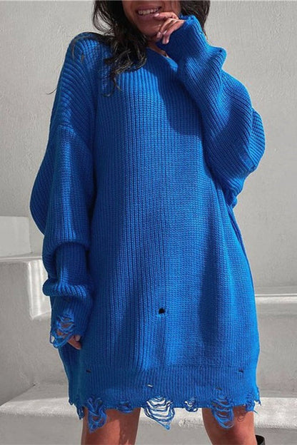 Ausgefranster Saum am unteren Rand des Strickpullovers