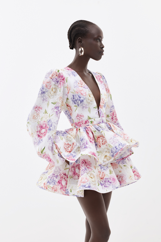 Damen Minikleid mit Blumenmuster und Ballonärmeln in Vorderansicht