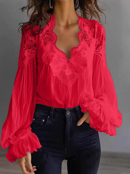 Damenbluse mit Spitzen- und Patchwork-Einsätzen und Puffärmeln