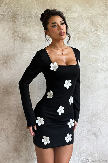 Damen Minikleid mit taillenbetonter Passform und floralem Print in Rückansicht