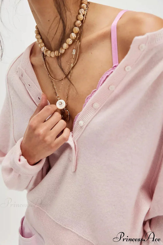 Damen Strickpullover mit V-Ausschnitt und lockerer Passform in Vorderansicht