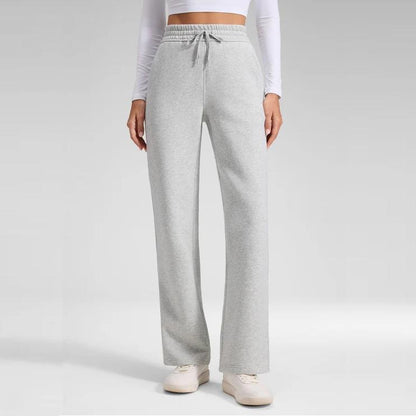 Damenhose mit hohem Bund und weit fallendem Bein in Seitenansicht