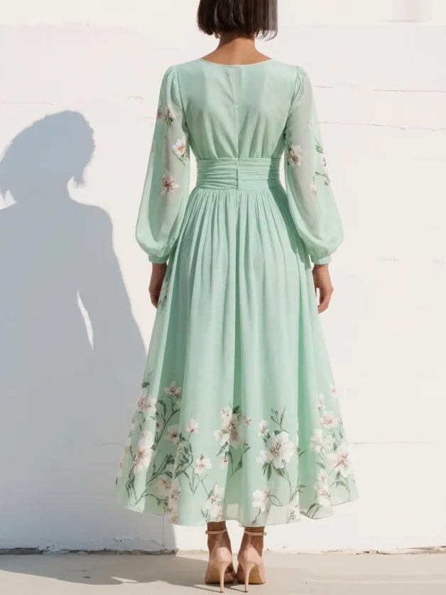 Grünes Midikleid für Damen mit floralm Muster und kurzen Flutter-Ärmeln