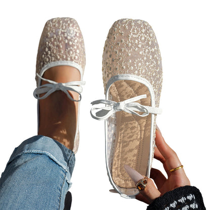 Spitzen-Ballerinas für Damen mit Zierschleife von vorne fotografiert