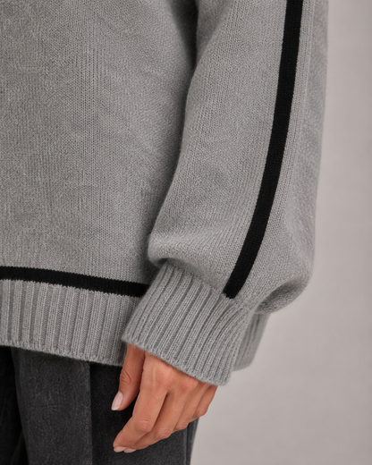 Damen-Rollkragenpullover mit markanter Kontrastpaspel und weicher Strickoptik